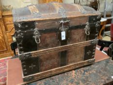 A late Victorian leather and metal mounted dome top trunk with scrap-work interior, length 76cm,