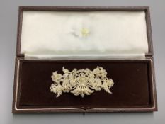 A 19th century seed pearl encrusted brooch, 10.8 cm.