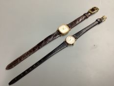 Two lady's modern 9ct gold quartz wrist watches, Omega and Avia, on leather straps, gross 19.3