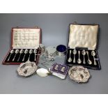 A three-piece silver condiment set and a collection of small silver,including a set of six cased