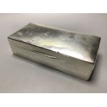 A George V silver mounted rectangular cigarette box, Birmingham, 1929, 19.3 cm.