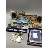 Modern items of silver including wine coaster, photograph frames, timepiece etc.