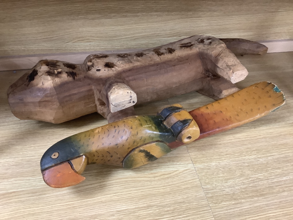 A decorative 20th century Brazilian carved wood dog and a painted carved wood parrot, longest - Image 2 of 2