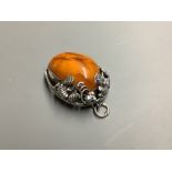 A 925 mounted amber pendant, 39 mm, gross weight 14 g.