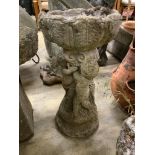 A reconstituted stone figural bird bath, width 30cm, height 54cm