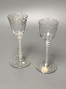 Two George III double series opaque twist stem cordial glasses, c.1760-70, with wheel engraved