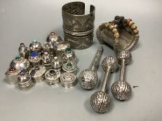 Sixteen Omani decorative silver trinket boxes, inset various semi-precious stones, a wide embossed