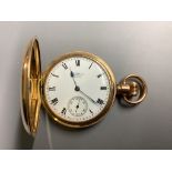 A gold plated Waltham hunter pocket watch.