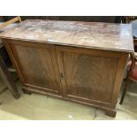 An Edwardian mahogany two door cabinet, length 122cm, depth 51cm, height 86cm