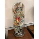 A Victorian fabric floral display under glass dome, height 78cm