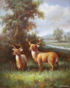A modern oil on board of deer in a landscape, 24 x 19cm