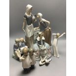 Four Nao figures and a Lladro group