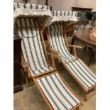 A pair of beech garden deck chairs with folding sun canopies by Sarah Burgoyne