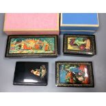 A group of three Russian Palekh lacquered boxes and similar address book