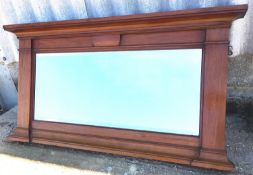 An early 20th century mahogany overmantel mirror, width 144cm, height 77cm