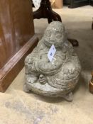 A reconstituted stone Buddha garden ornament, height 28cm