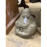 A reconstituted stone Buddha garden ornament, height 28cm