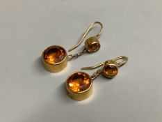 A pair of yellow metal and two stone citrine set drop earrings,25mm, gross 5.7 grams.