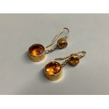 A pair of yellow metal and two stone citrine set drop earrings,25mm, gross 5.7 grams.