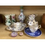 A Rockingham part teaset, c.1835, two glass paperweights, two glass vases and a French garlic neck