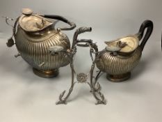 A late 19th century Dutch fluted white metal tea kettle, by Bonebakken & Zoon, with damaged stand