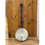 A cased banjo, unmarked