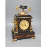 A 19th century French slate and onyx mantel clock, Lyon, height 42cm