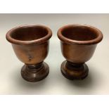 A pair of George III treen boxwood cups14cm