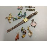 Assorted jewellery including a 9ct and gem set bar brooch, 925 and costume and a Raymond Weil gold