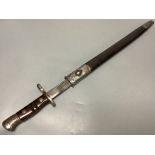 A WWII bayonet, blade marked ‘1913 3 17 REMINGTON’