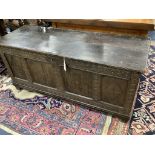 A 17th century oak coffer, length 142cm, depth 53cm, height 64cm