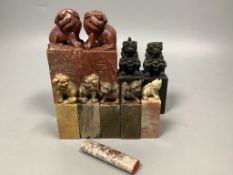 A pair of Chinese ‘chicken’s blood’ soapstone seals and eight other soapstone seals, tallest