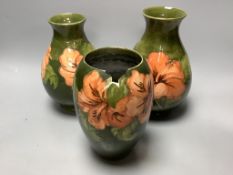 Two Moorcroft Hibiscus vases and another, similar, tallest 21cm