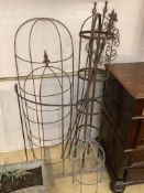 Nine assorted wrought iron growing frames and stakes, largest 148cm high