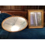 A rectangular gilt framed wall mirror, width 52cm, height 60cm, together with an oval gilt framed