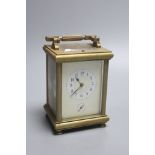 An E. Maurice & Co hour repeating carriage clock, height 16cm with handle down