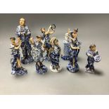 A set of eight German porcelain musicians, height 17cm