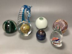 Seven paperweights
