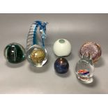 Seven paperweights
