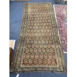 A Caucasian Boteh rug, 255 x 122cm