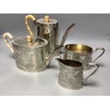 A Mappin & Webb Co. four-piece silver-plated tea and coffee service in the Aesthetic manner