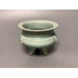 A Chinese celadon glazed tripod censer, diameter 11cm