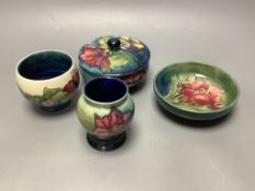 Four pieces of Moorcroft including a covered powder box
