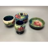 Four pieces of Moorcroft including a covered powder box