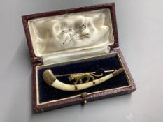 An Indian 14ct and bone mounted 'tiger' set curved brooch, by Hamilton & Co, in original box,7cm,