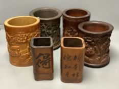 Six Chinese carved bamboo and wood brush pots, tallest 17.5cm