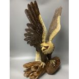 A carved wood eagle, height 61cm