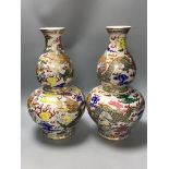 A pair of Chinese famille rose double gourd-shaped vases, height 40cm