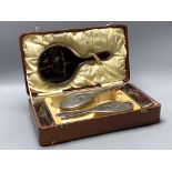 A cased George V silver and tortoiseshell mounted six piece mirror and brush set, maker Harper and