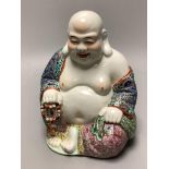 A Chinese famille rose figure of Budai, height 19cm